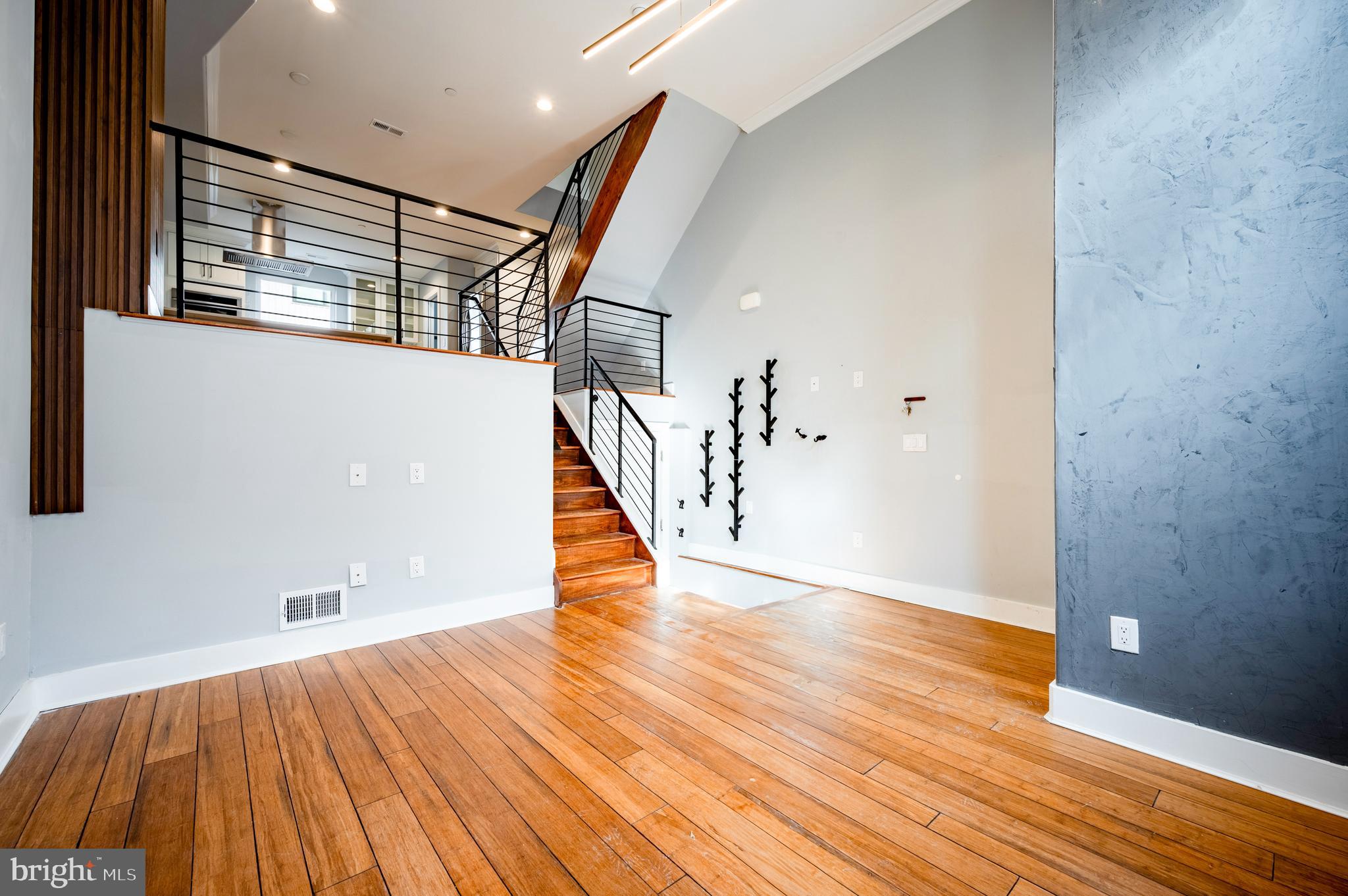 605 McClellan Street Philadelphia, PA 19148 - Photo 21 of 26 a view of an empty room with wooden floor and a bathroom