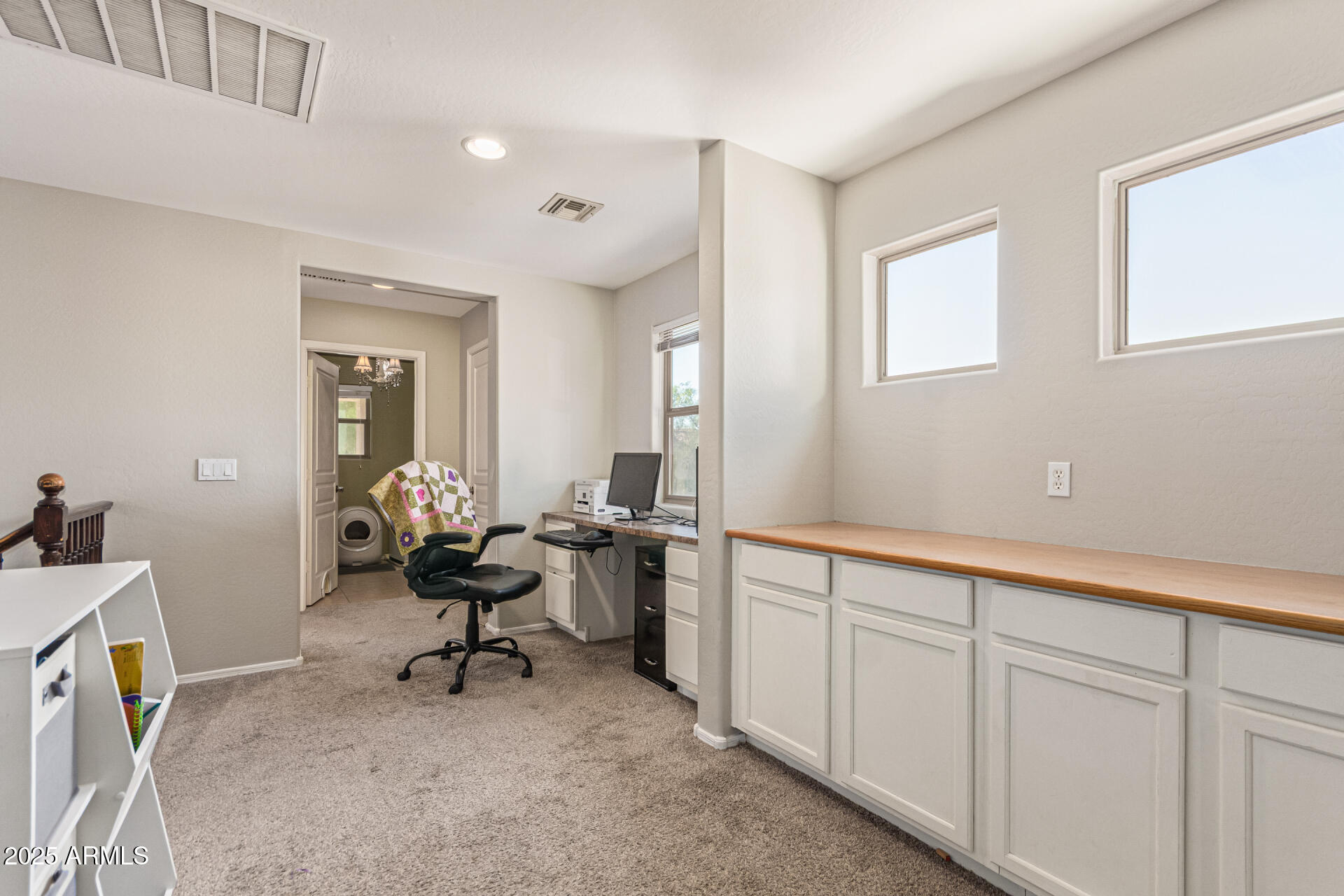 3802 East Chickadee Road Gilbert, AZ 85297 - Photo 22 of 29 a living room with furniture a air conditioner vent and a window