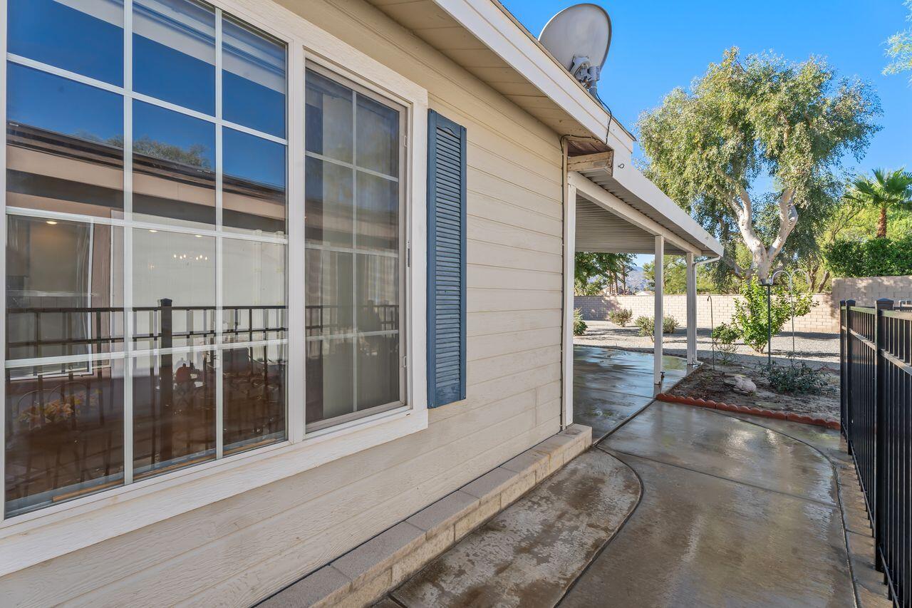 47857 Prado Way Indio, CA 92201 - Photo 29 of 36 a view of a house with a backyard