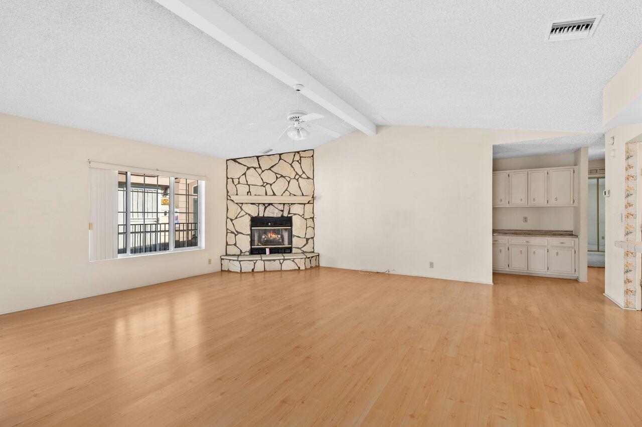 47857 Prado Way Indio, CA 92201 - Photo 6 of 36 an empty room with windows and closet