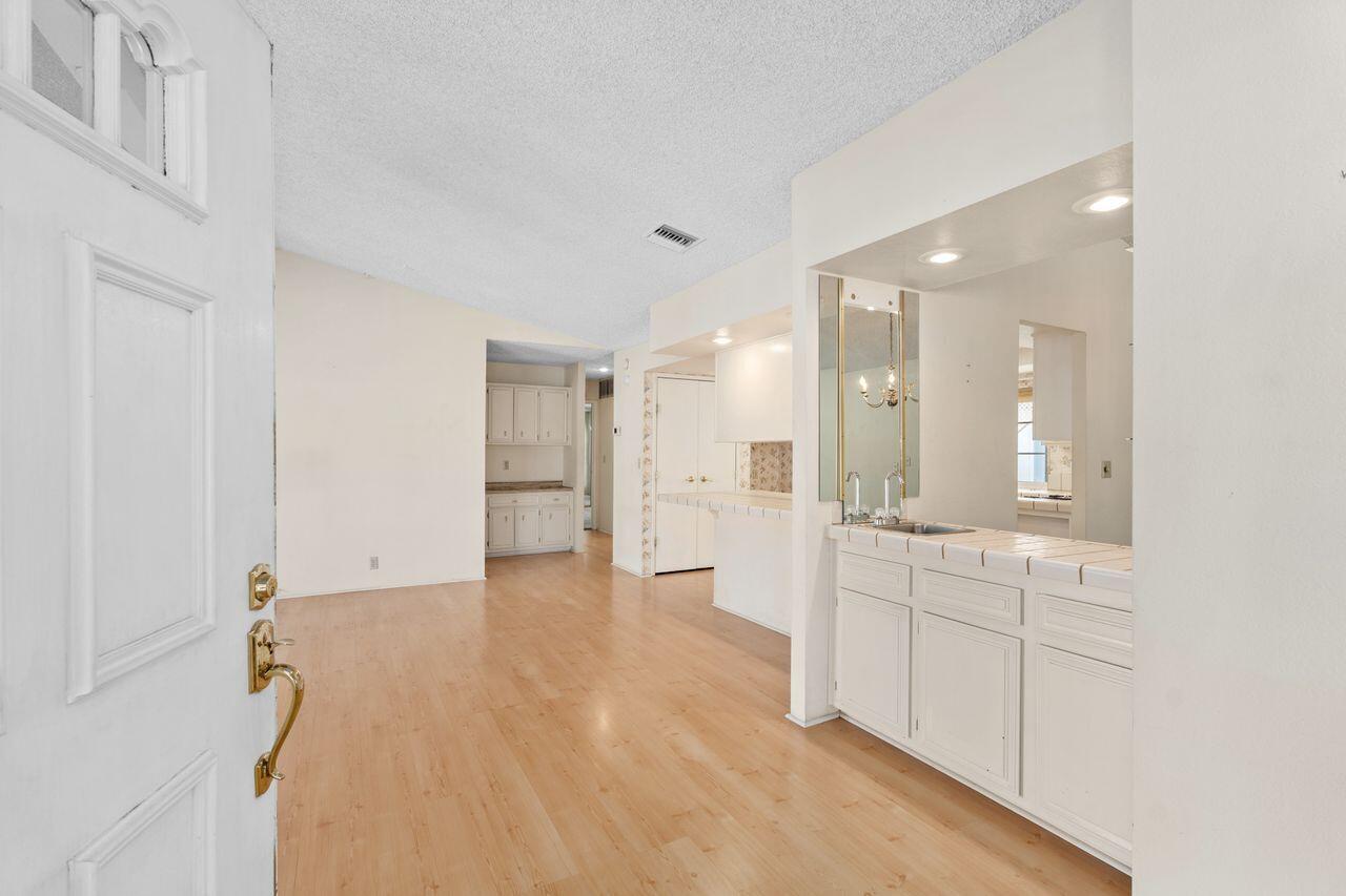 47857 Prado Way Indio, CA 92201 - Photo 7 of 36 a bathroom with a sink and a mirror