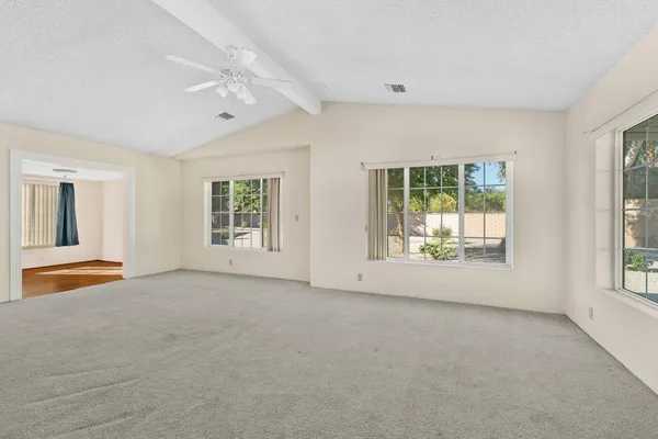 an empty room with windows