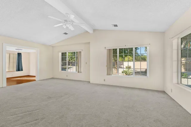 an empty room with windows