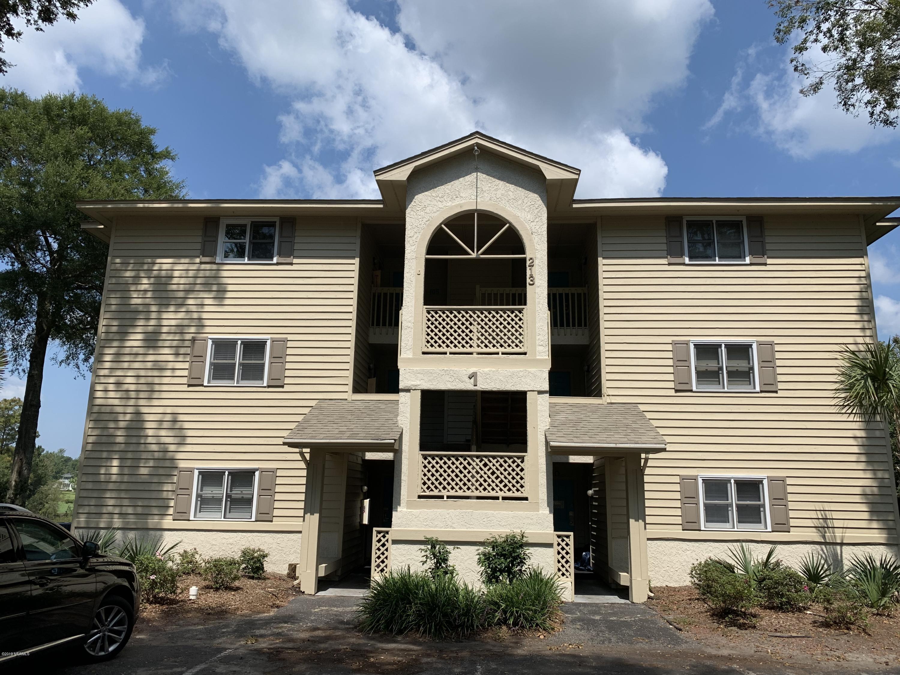 213 Clubhouse Road, Unit 1 Sunset Beach, NC 28468 - Photo 1 of 25 front