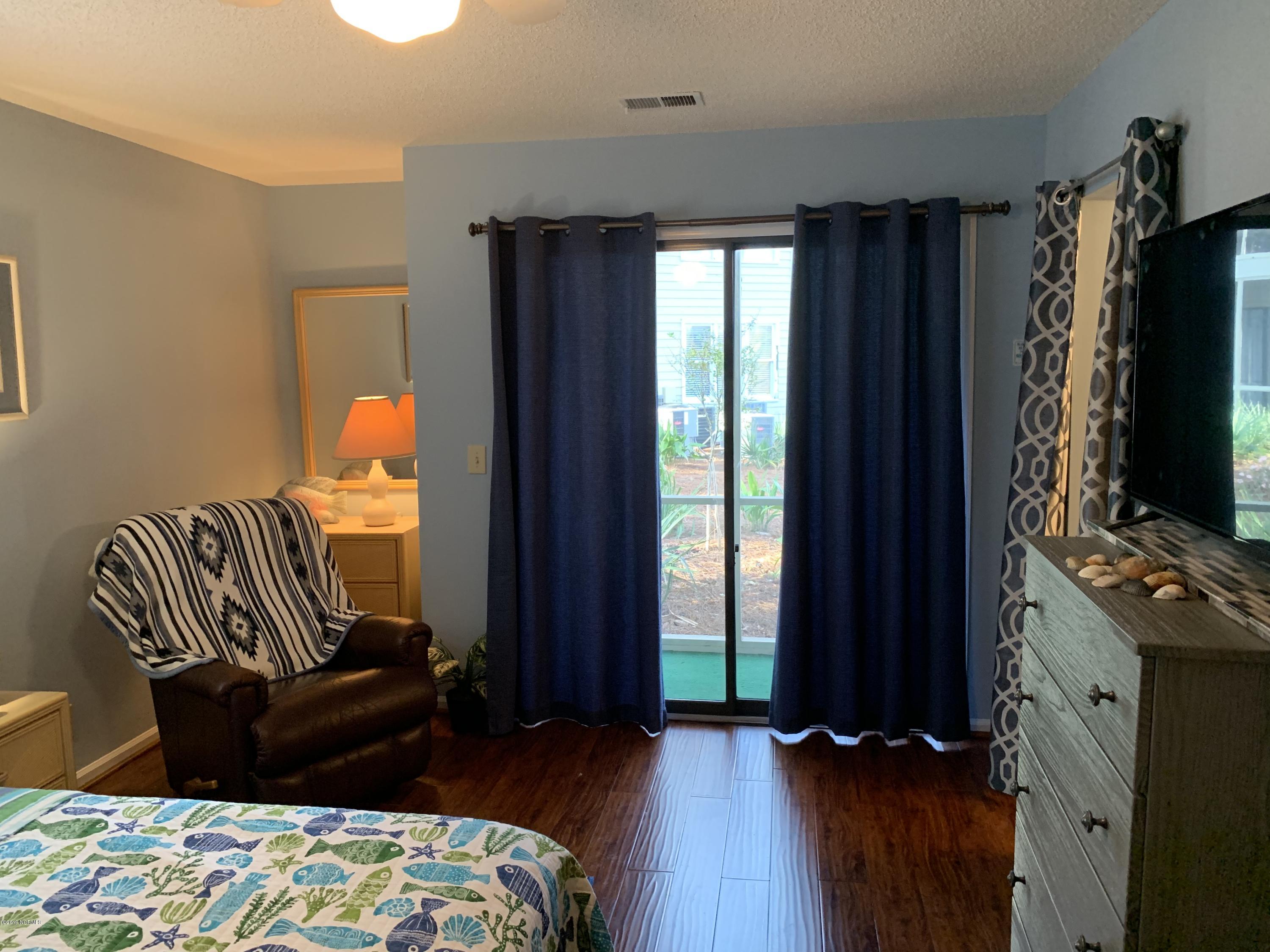 213 Clubhouse Road, Unit 1 Sunset Beach, NC 28468 - Photo 5 of 25 IMG_3333 - Copy