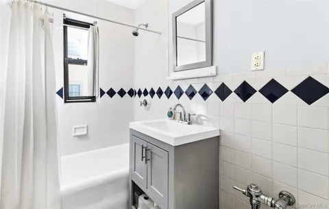 a bathroom with a sink and a bathtub