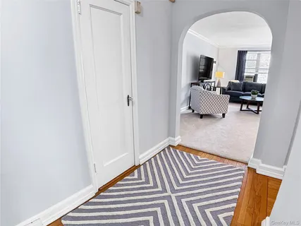 a kitchen with a stove a sink and a stove