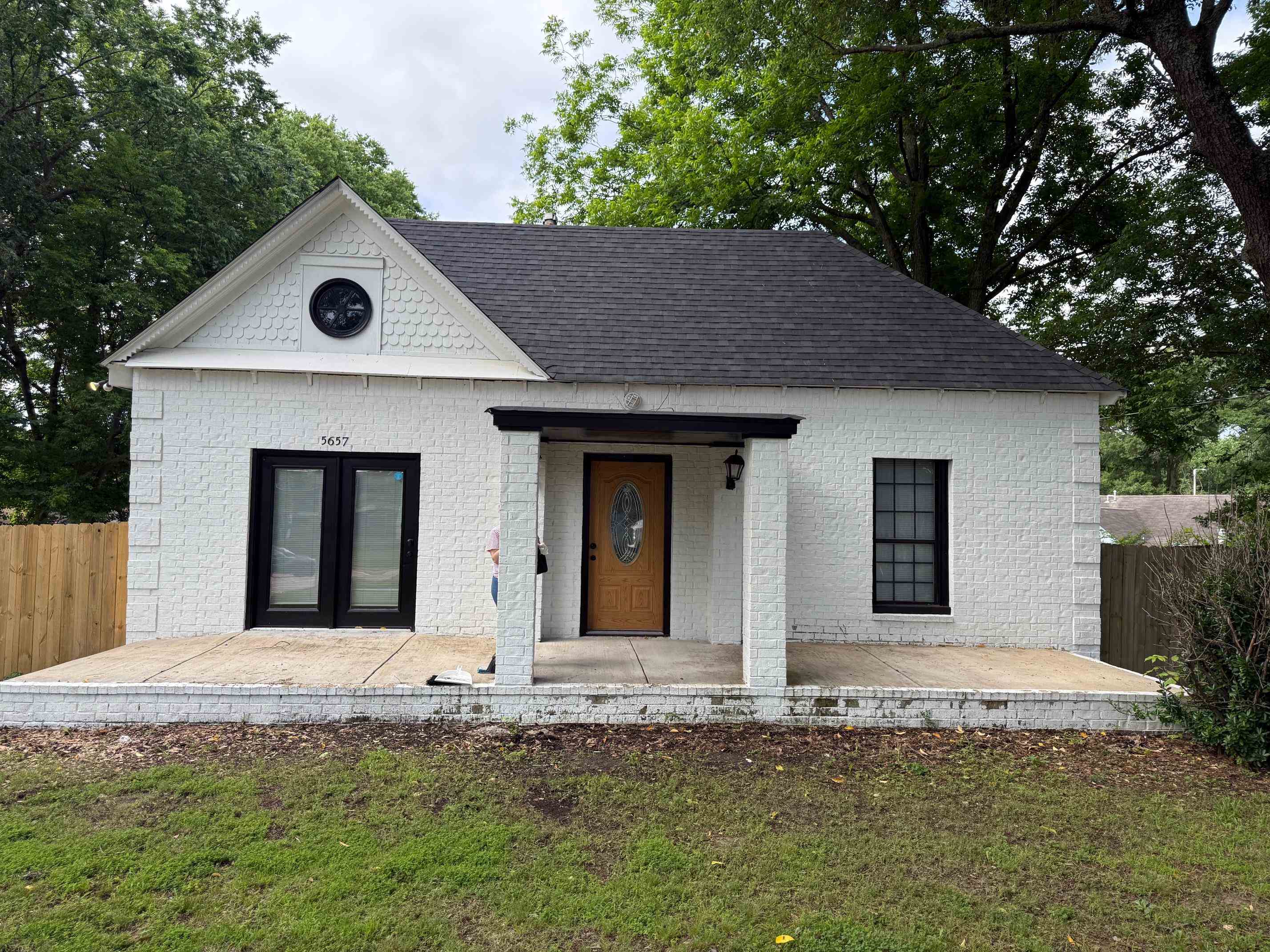 5657 Raleigh Lagrange Road Memphis, TN 38134 - Photo 1 of 8 View of front facade with brick siding, a shingled roof, and french doors