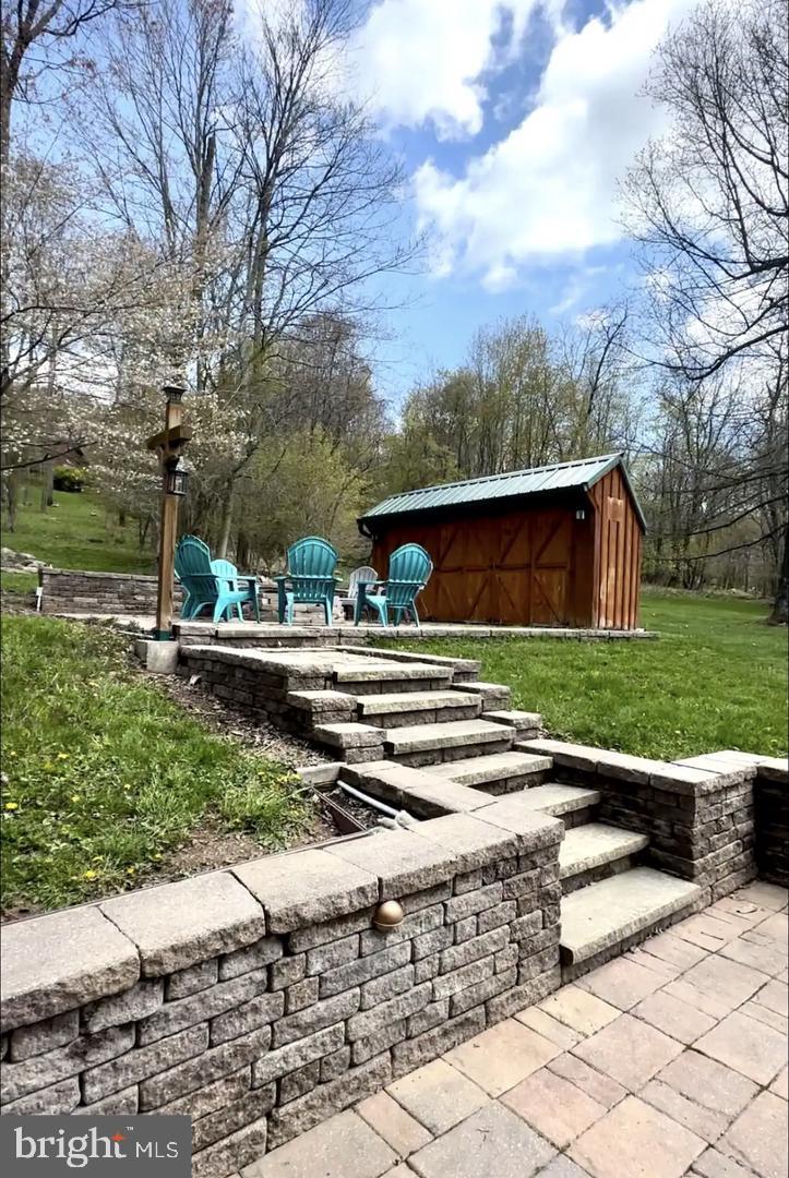 229 Rock Lodge Road McHenry, MD 21541 - Photo 13 of 16 Charming outdoor retreat with shed.
