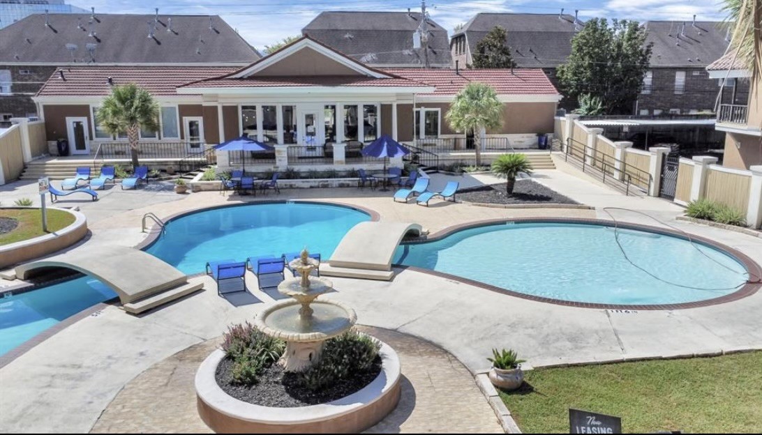 2744 Briarhurst Drive, Unit 50 Houston, TX 77057 - Photo 3 of 23 a swimming pool with outdoor seating yard and barbeque oven