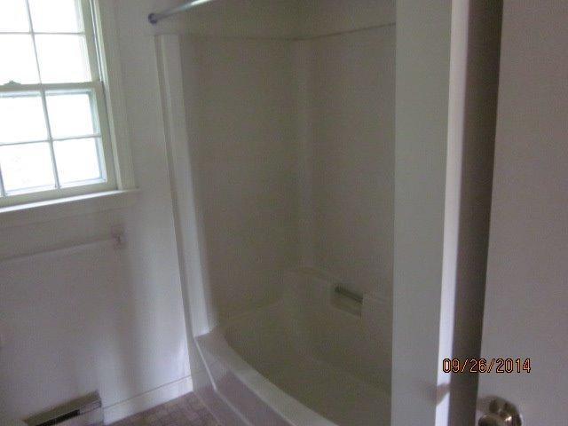 110 West Main Street, Unit 15 Hyannis, MA 02601 - Photo 4 of 10 a bathroom with a shower
