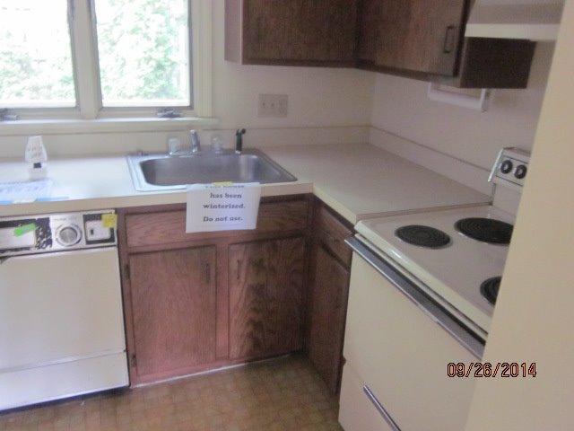 110 West Main Street, Unit 15 Hyannis, MA 02601 - Photo 7 of 10 a utility room with dryer and washer