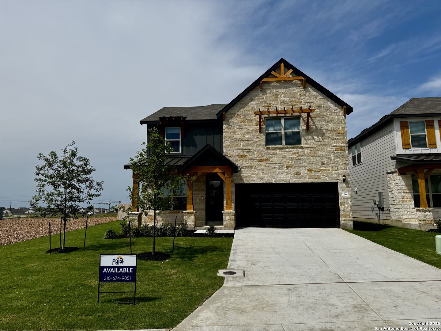 4002 Paddock Trail Seguin, TX 78155 - Photo 1 of 1 a front view of a house with a yard
