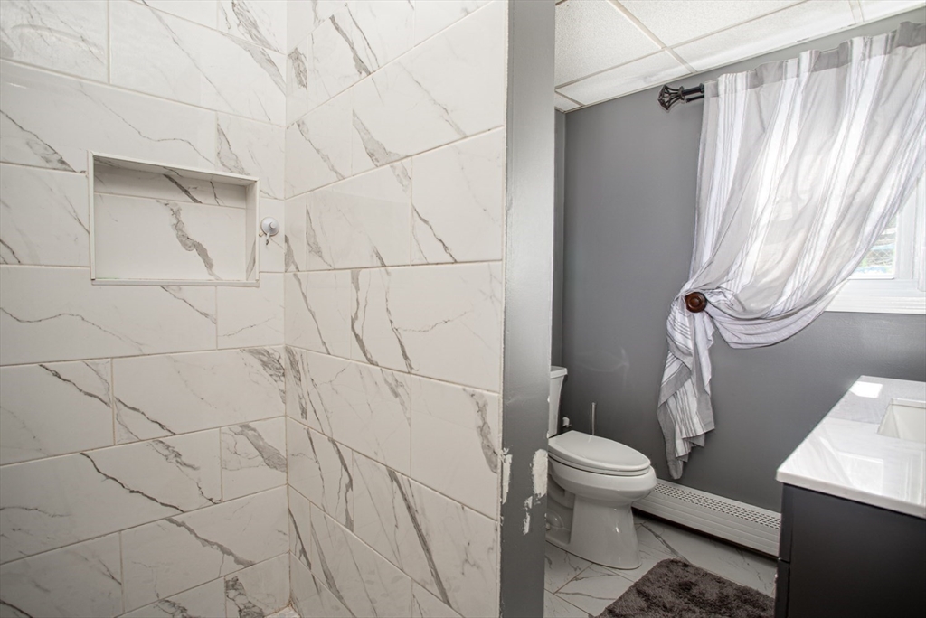 425 Pearce Street Fall River, MA 02720 - Photo 16 of 33 a bathroom with a toilet and a shower
