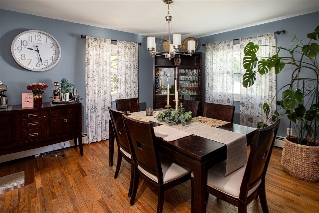 425 Pearce Street Fall River, MA 02720 - Photo 17 of 33 a view of a dining room with furniture window and wooden floor