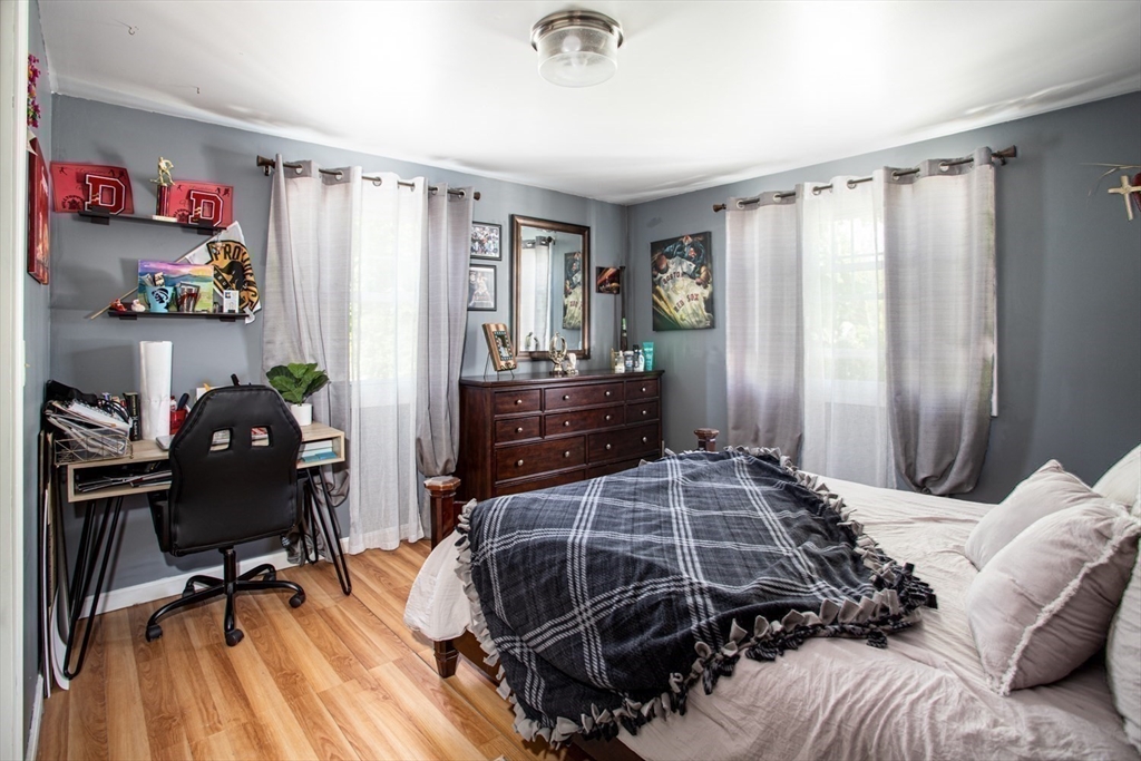 425 Pearce Street Fall River, MA 02720 - Photo 25 of 33 a bedroom with a bed and a desk