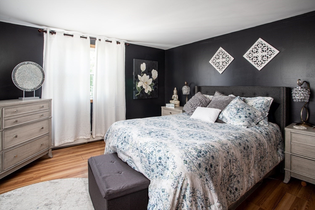 425 Pearce Street Fall River, MA 02720 - Photo 27 of 33 a bedroom with a bed and a dresser