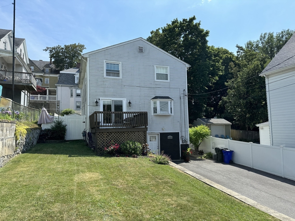 425 Pearce Street Fall River, MA 02720 - Photo 6 of 33 a front view of a house with garden