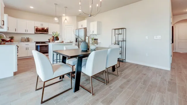 a view of kitchen with cabinets and wooden floor