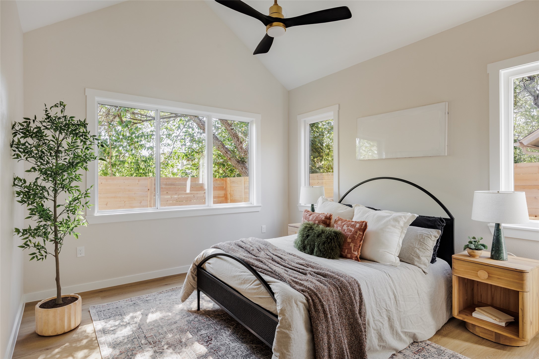 901 Redd Street Austin, TX 78745 - Photo 11 of 29 Downstairs Primary Bedroom with vaulted ceilings