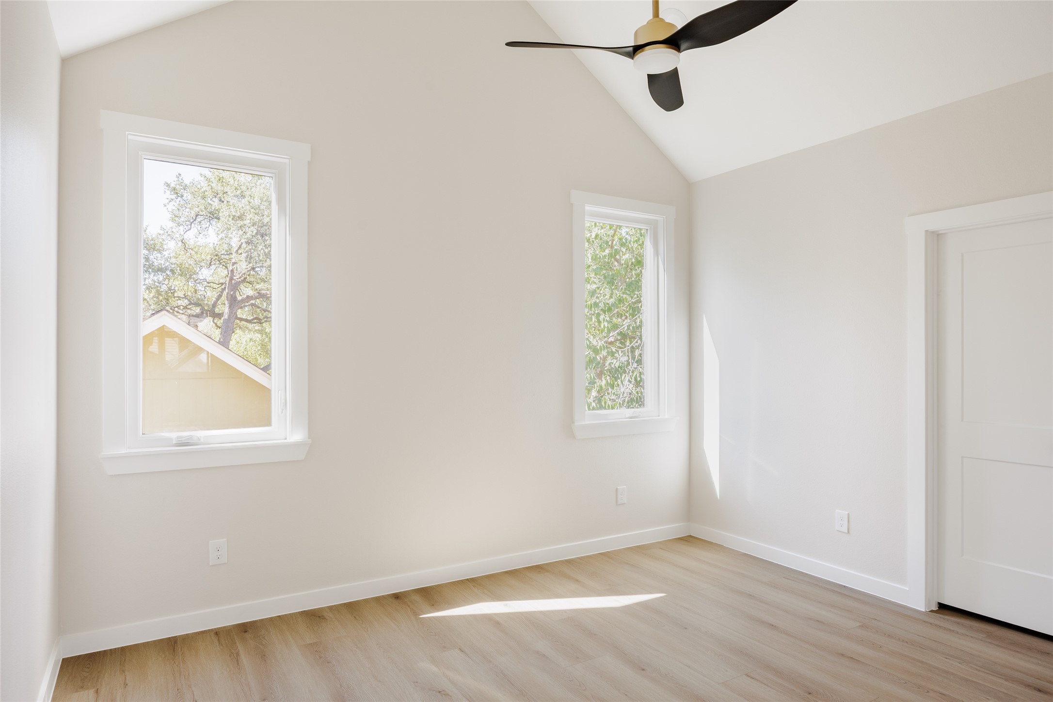 901 Redd Street Austin, TX 78745 - Photo 18 of 29 Bedroom 2 with vaulted ceilings