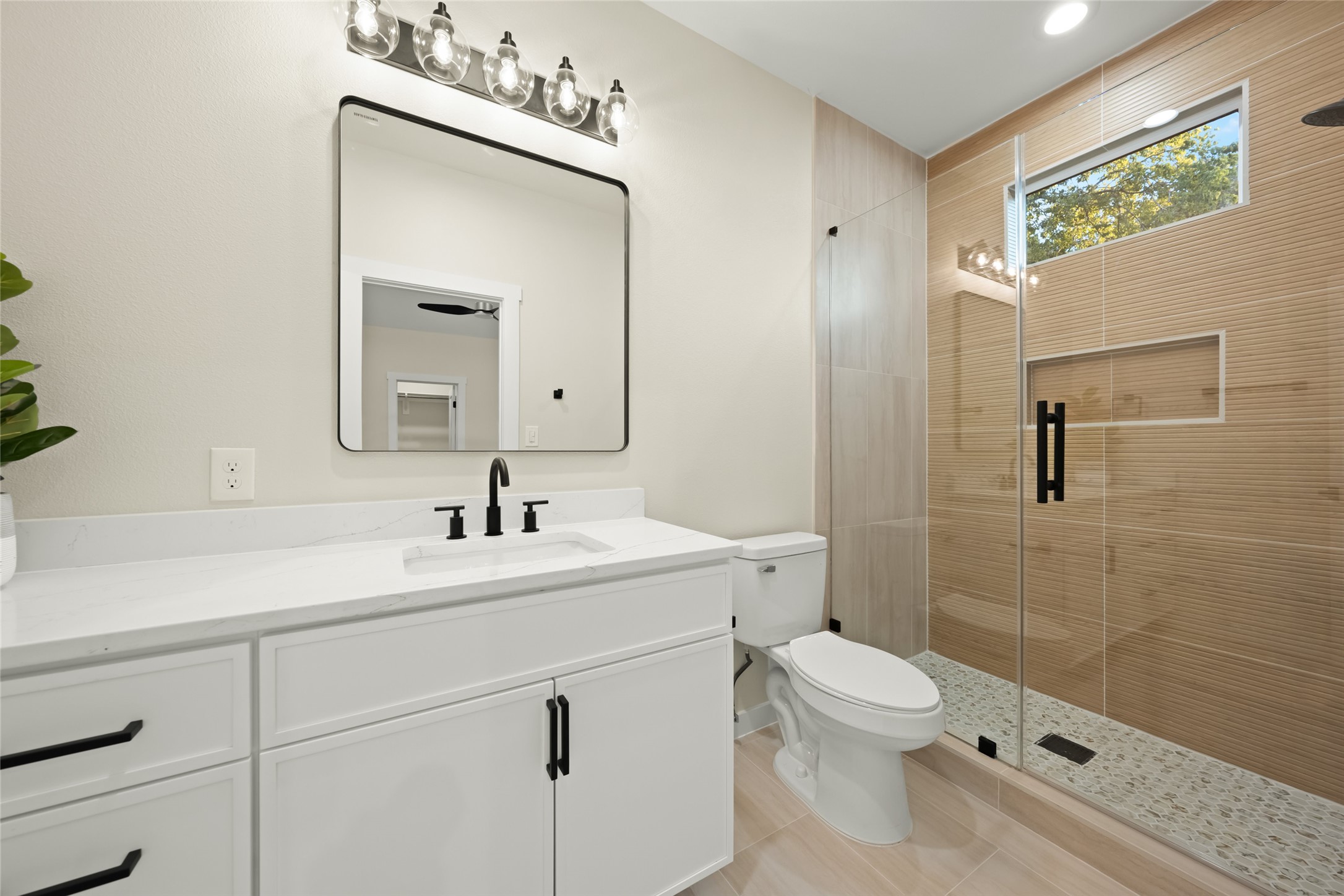 901 Redd Street Austin, TX 78745 - Photo 19 of 29 Bathroom 2 with custom fixtures and walk in shower