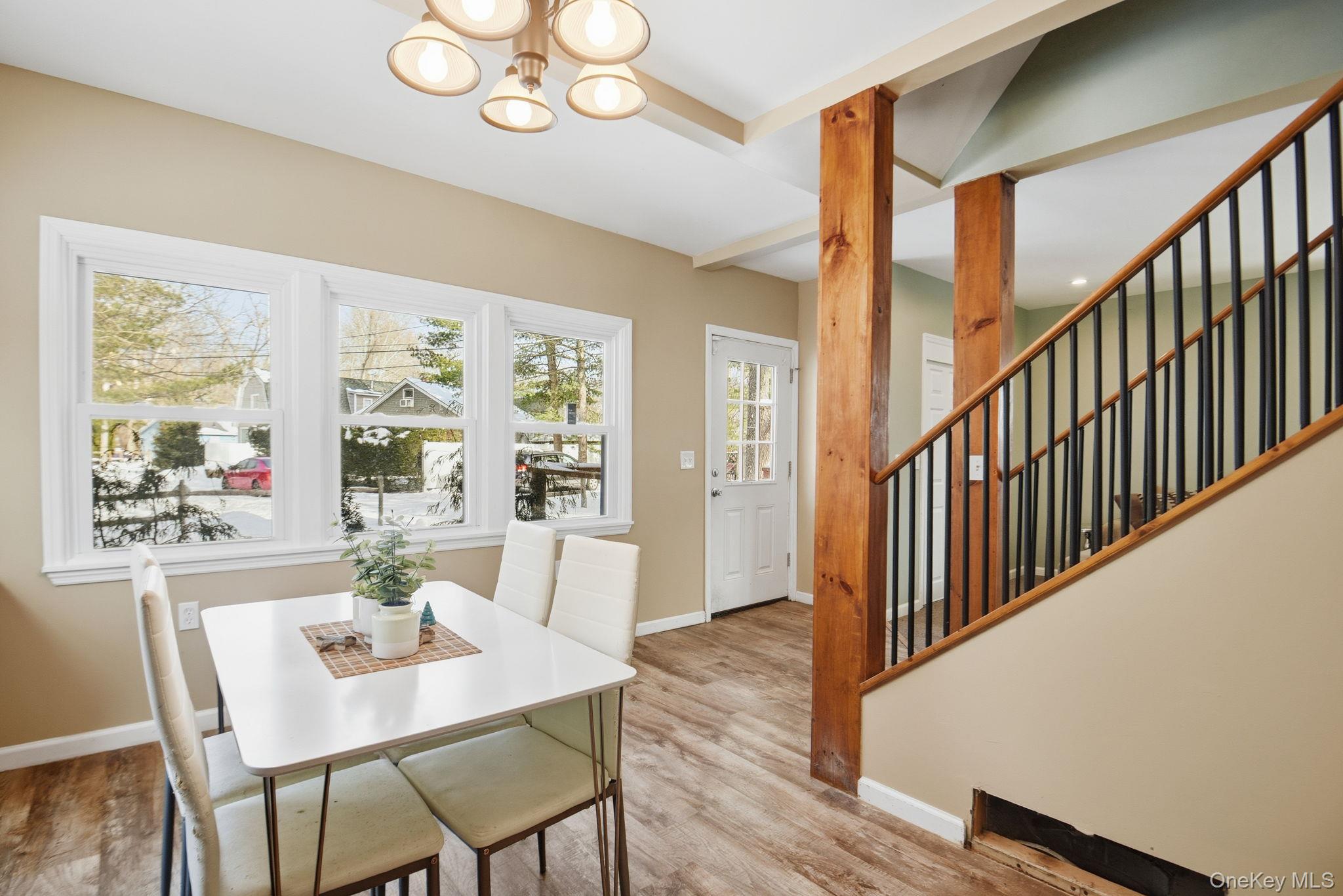 35 Shady Creek Road Pleasant Valley, NY 12569 - Photo 11 of 33 a view of a dining room with furniture window and wooden floor