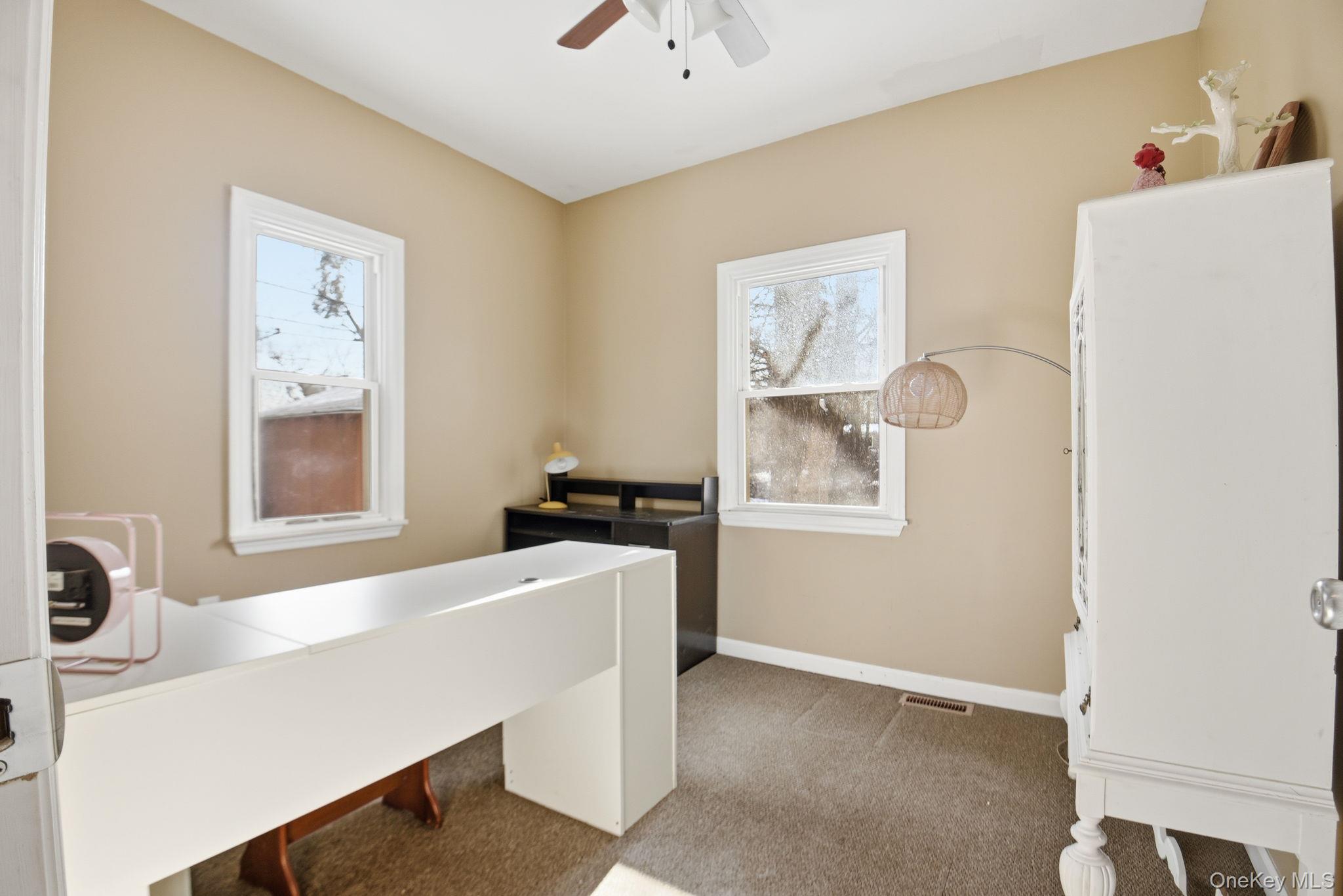 35 Shady Creek Road Pleasant Valley, NY 12569 - Photo 18 of 33 a room with a desk and a window