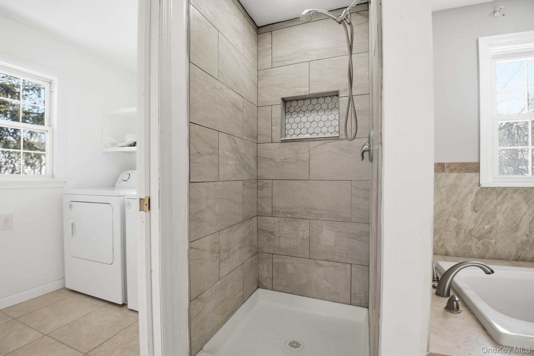 35 Shady Creek Road Pleasant Valley, NY 12569 - Photo 24 of 33 a bathroom with a bathtub and shower