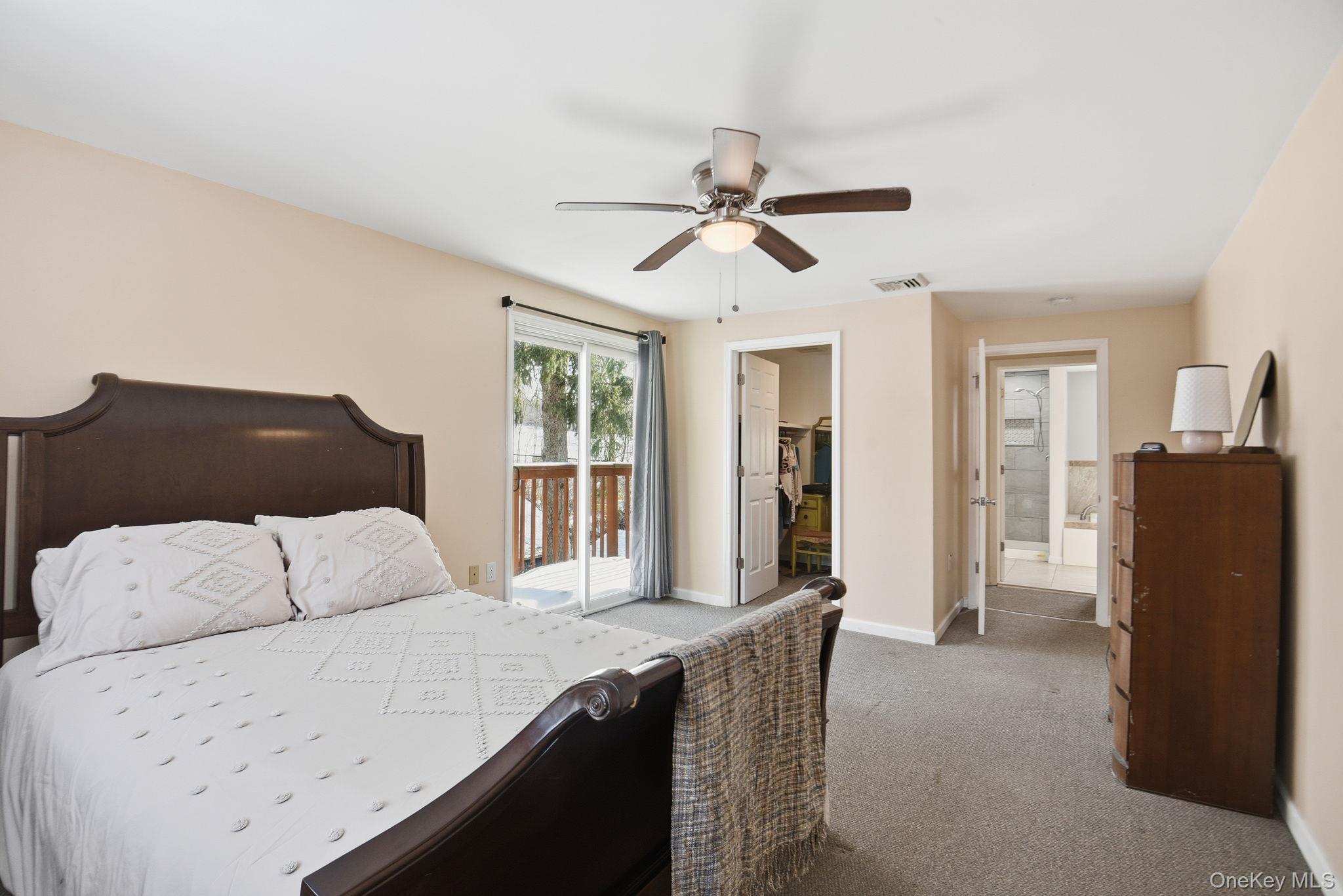 35 Shady Creek Road Pleasant Valley, NY 12569 - Photo 28 of 33 a bedroom with a large bed and a window