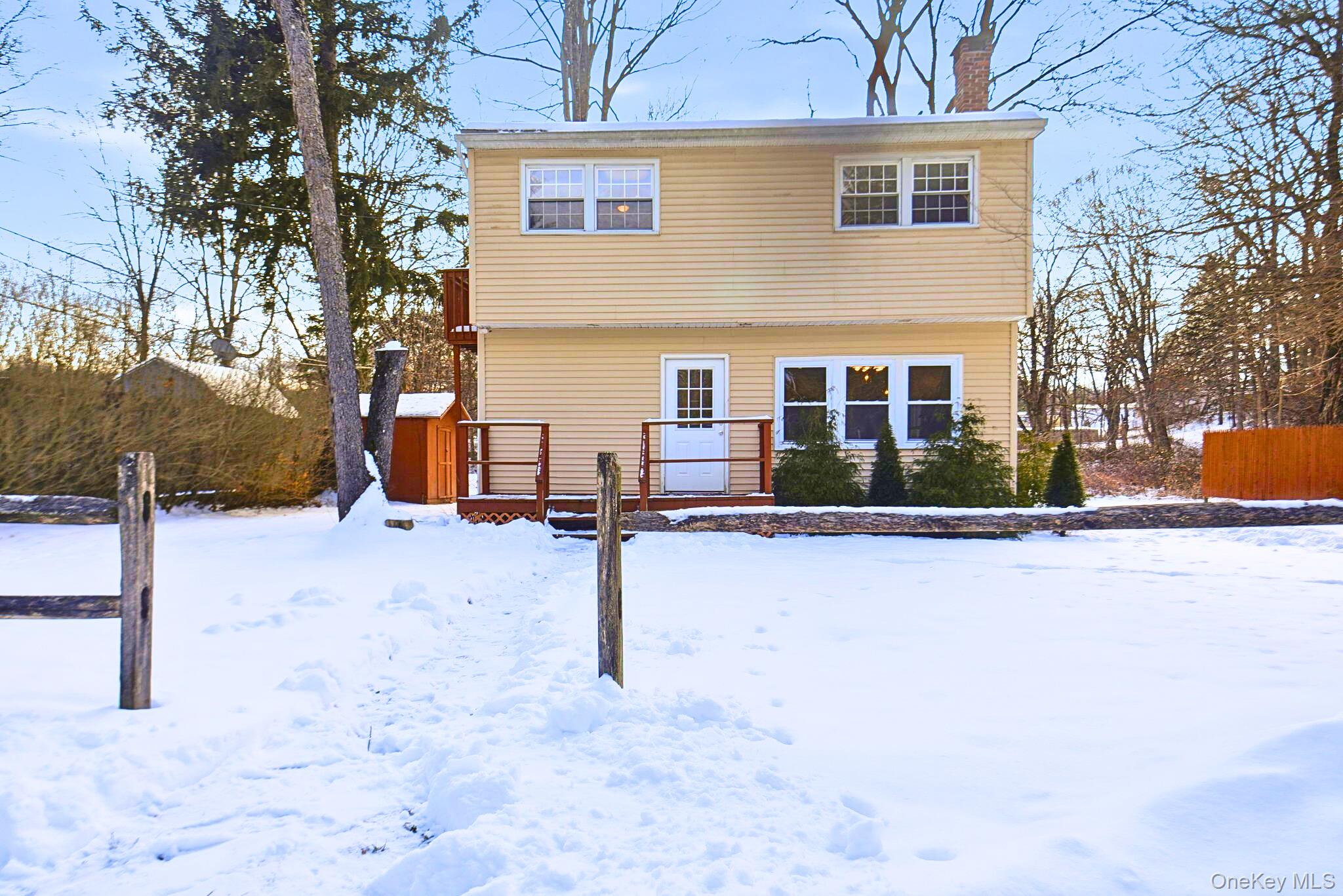 35 Shady Creek Road Pleasant Valley, NY 12569 - Photo 3 of 33 View of front of home featuring a wooden deck and a chimney