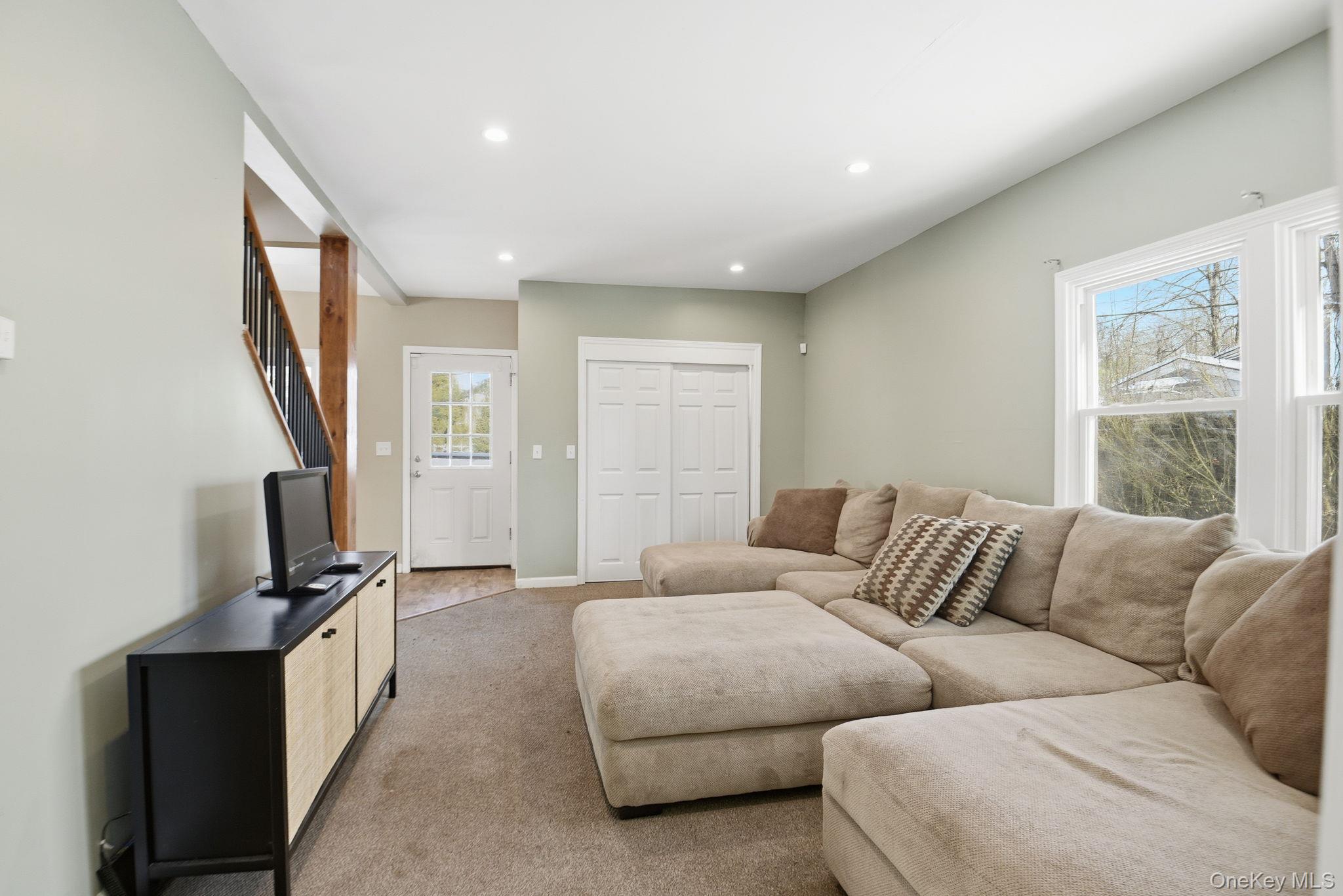 35 Shady Creek Road Pleasant Valley, NY 12569 - Photo 5 of 33 a bedroom with furniture and a flat screen tv