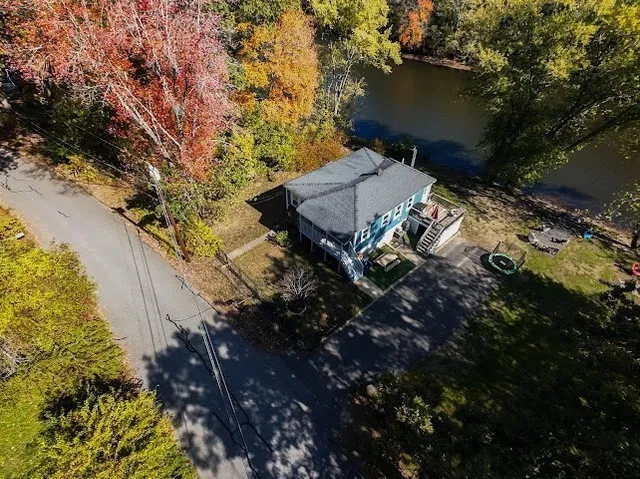 a view of a backyard of the house