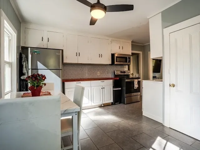 a view of a forest with a lake