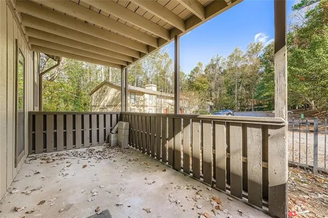 a view of a wooden fence
