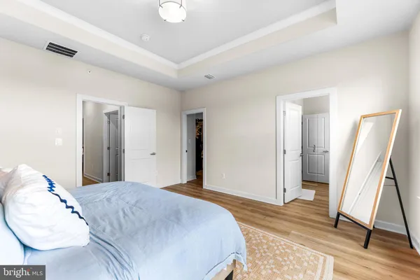 a view of multiple houses with a street