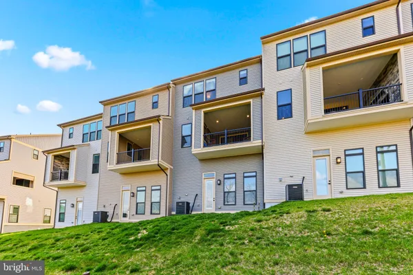 an aerial view of residential building and parking space
