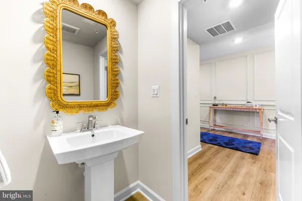 a view of entryway with wooden floor
