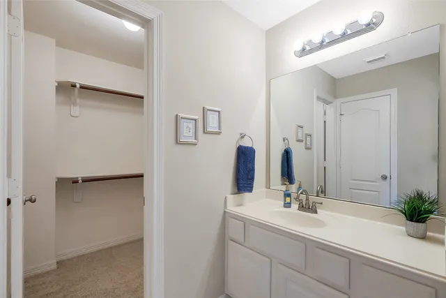 an aerial view of residential house with outdoor space and swimming pool