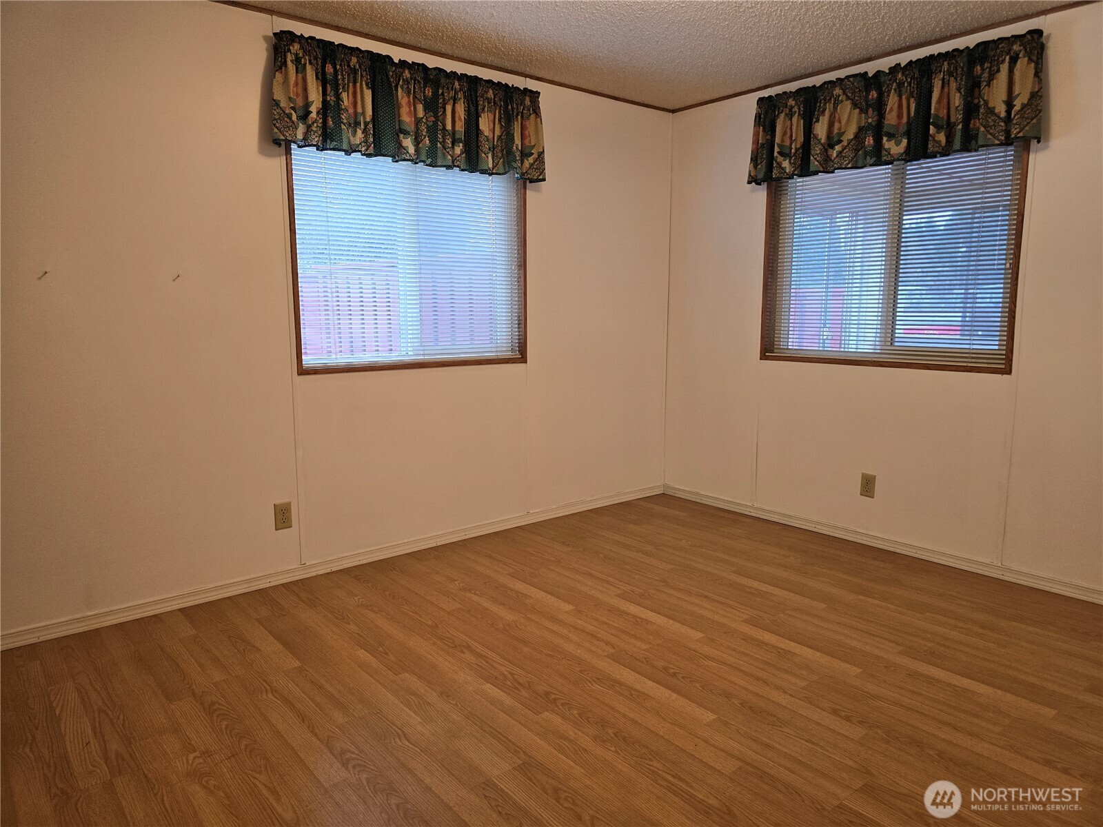 930 Trosper Road Southwest, Unit 78 Tumwater, WA 98512 - Photo 24 of 36 a view of an entryway with wooden floor