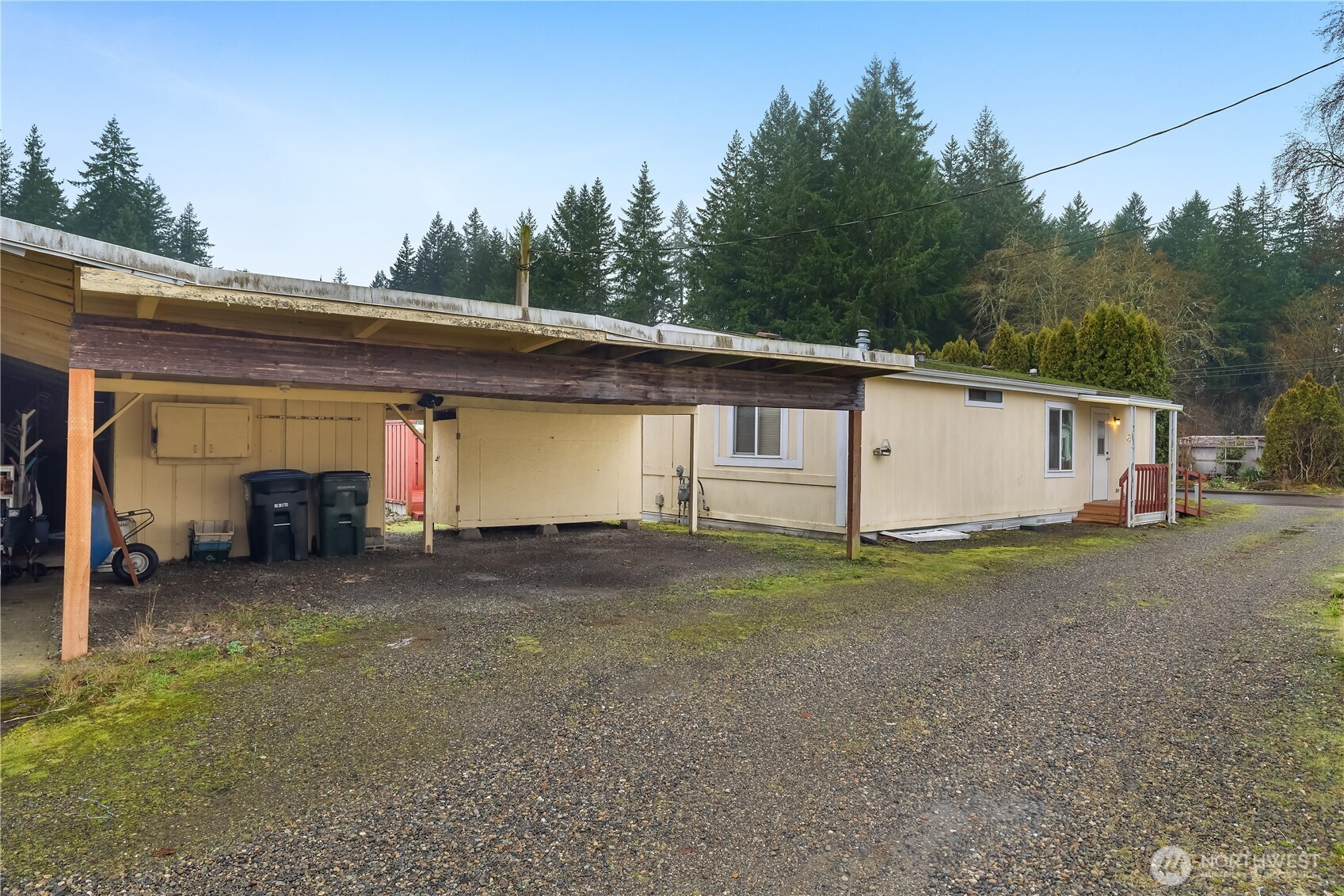 930 Trosper Road Southwest, Unit 78 Tumwater, WA 98512 - Photo 29 of 36 a view of a house with backyard