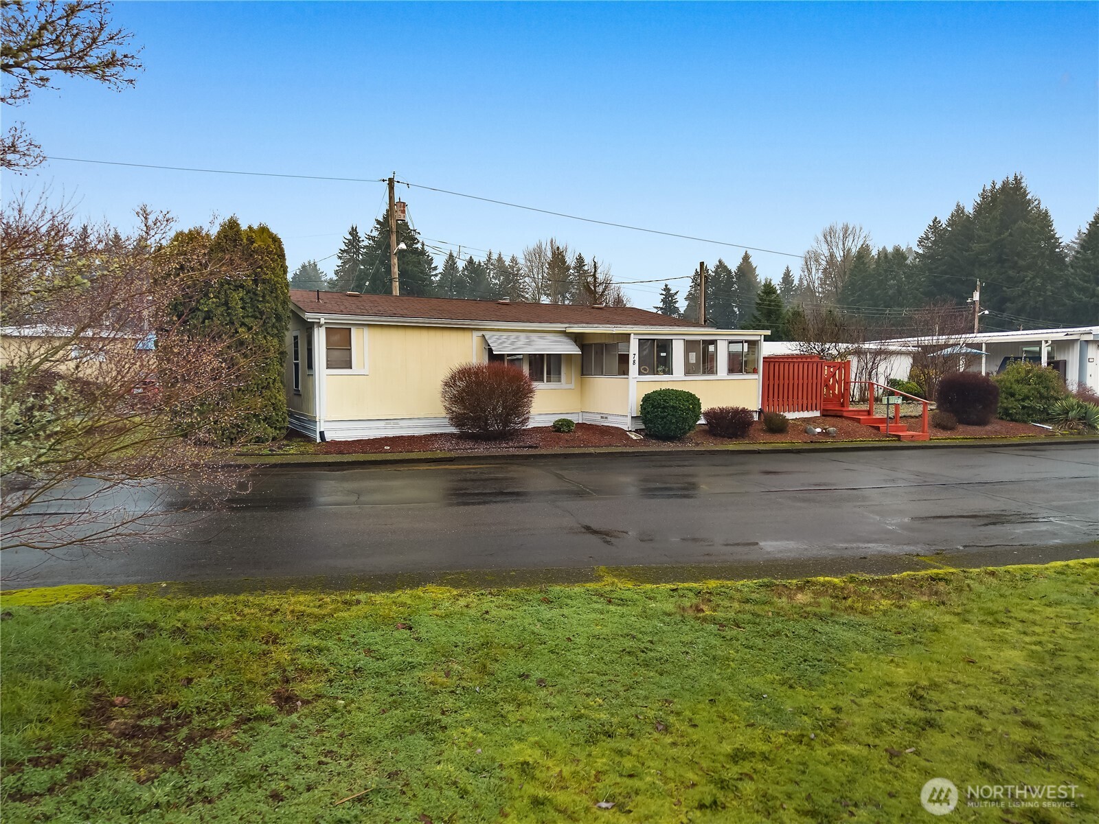 930 Trosper Road Southwest, Unit 78 Tumwater, WA 98512 - Photo 33 of 36 a view of house with swimming pool