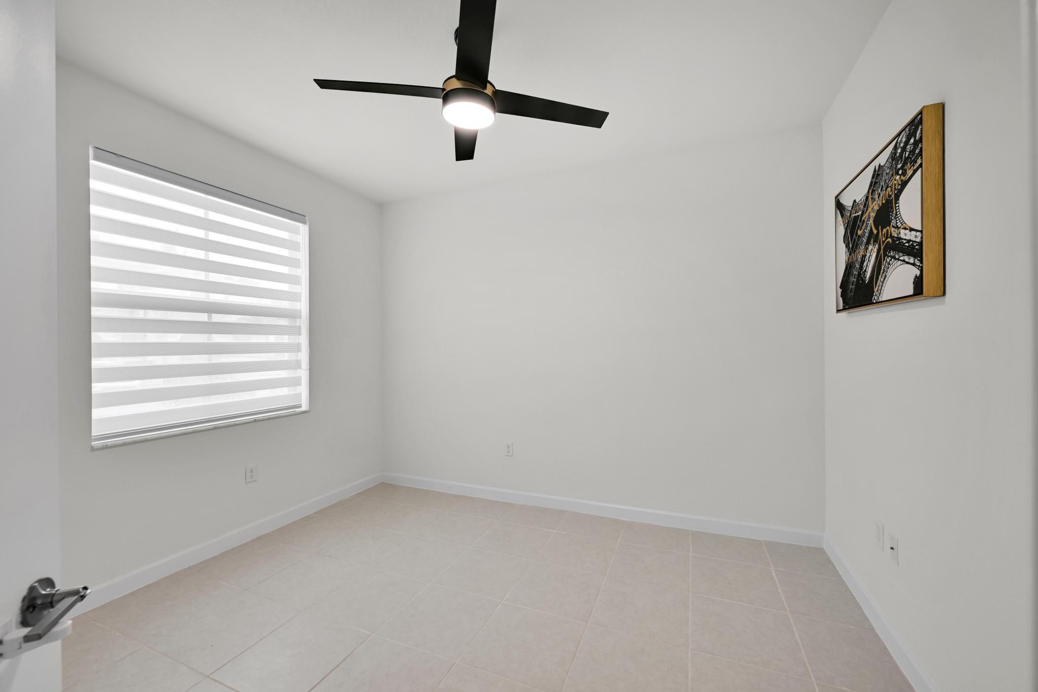 13234 Southwest 285th Street Homestead, FL 33033 - Photo 22 of 49 an empty room with a window