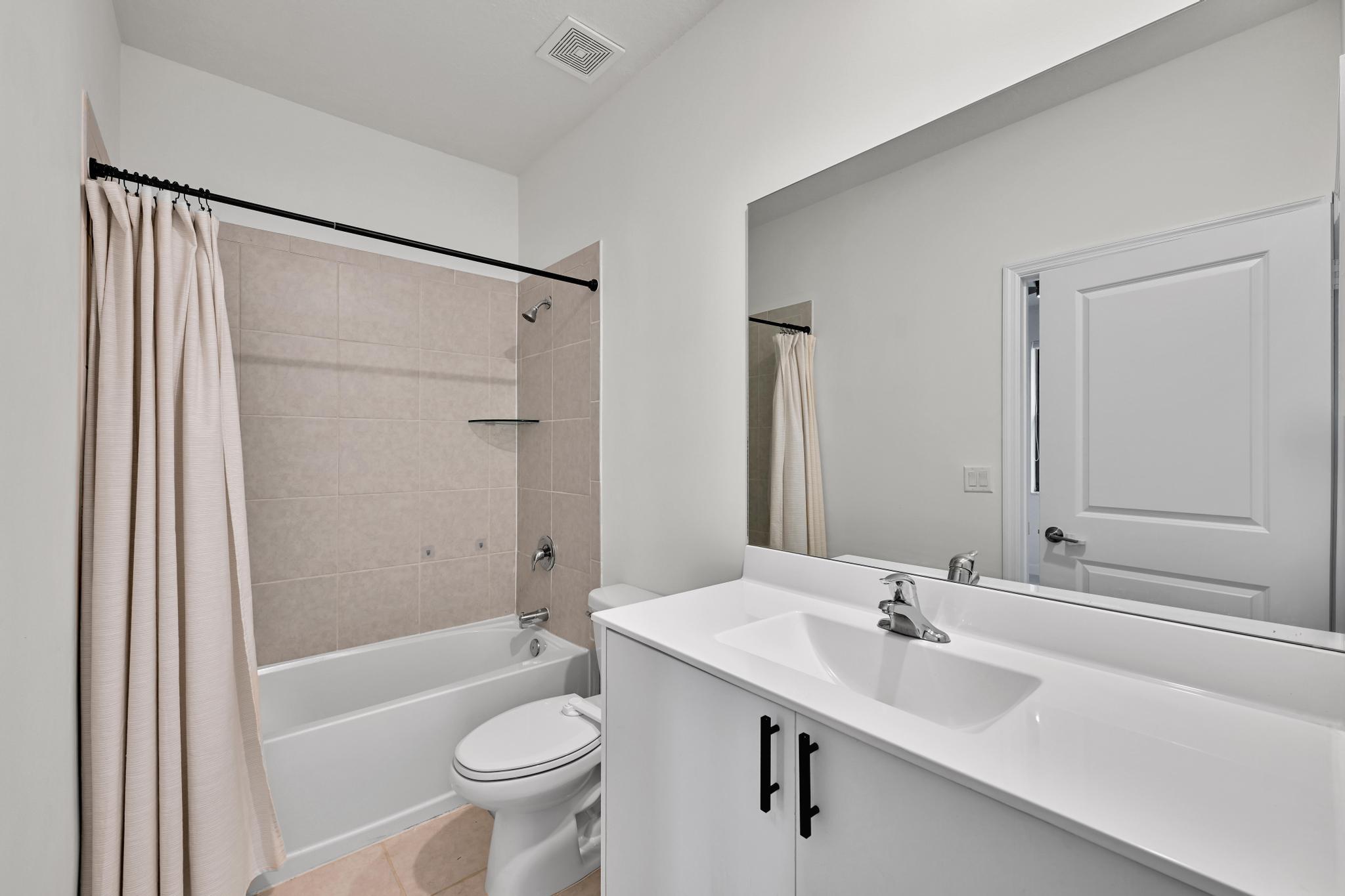 13234 Southwest 285th Street Homestead, FL 33033 - Photo 23 of 49 a bathroom with a sink a toilet and shower