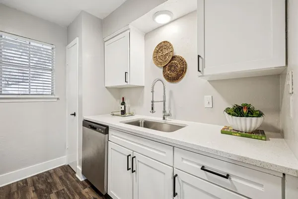 a kitchen with a sink and a cabinets
