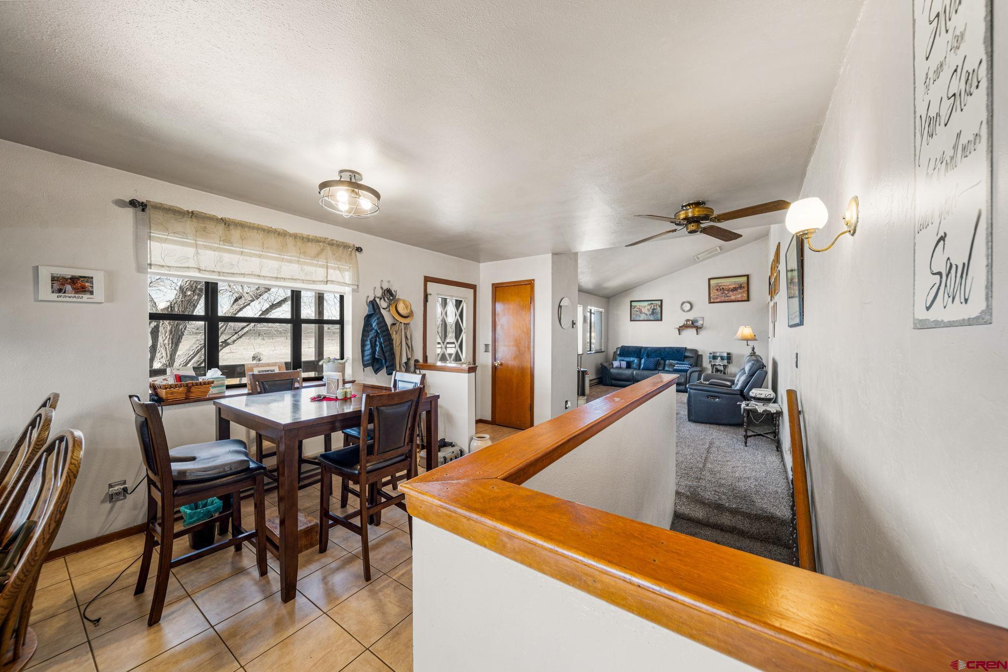 25220 County Rd M Cortez, CO 81321 - Photo 16 of 45 a view of a dining room with furniture and window