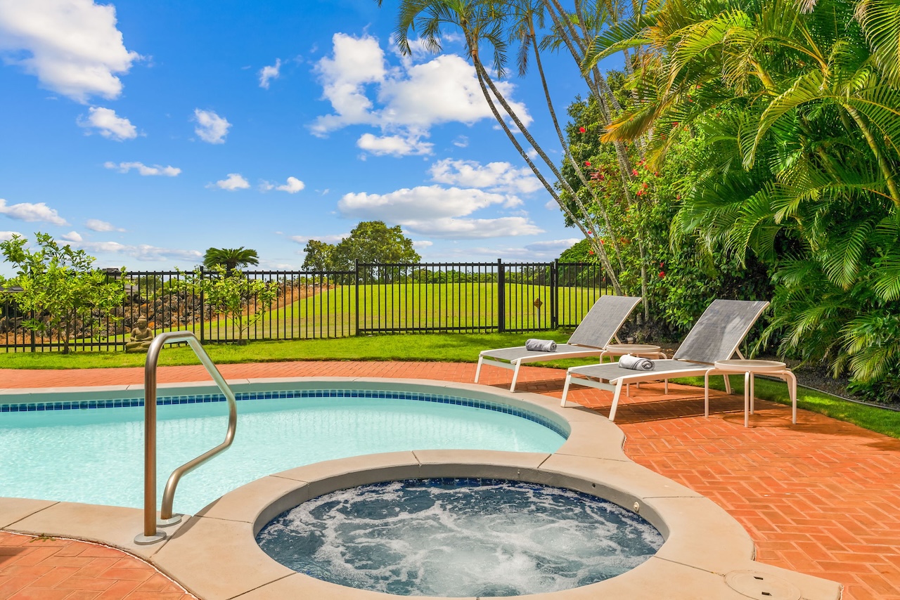 2868 Milo Hae Loop Koloa, HI 96756 - Photo 11 of 30 a view of a swimming pool with a lounge chairs