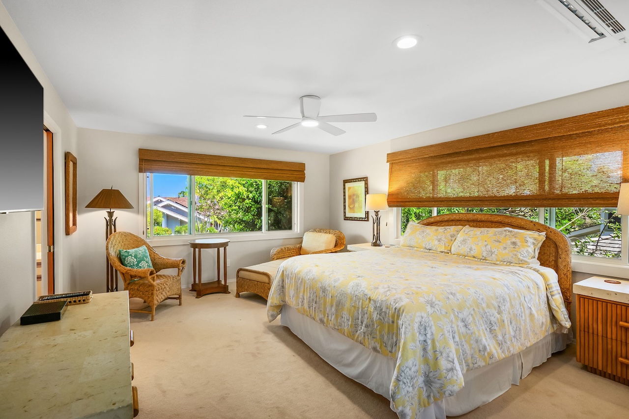 2868 Milo Hae Loop Koloa, HI 96756 - Photo 23 of 30 a bedroom with a large bed and a large window