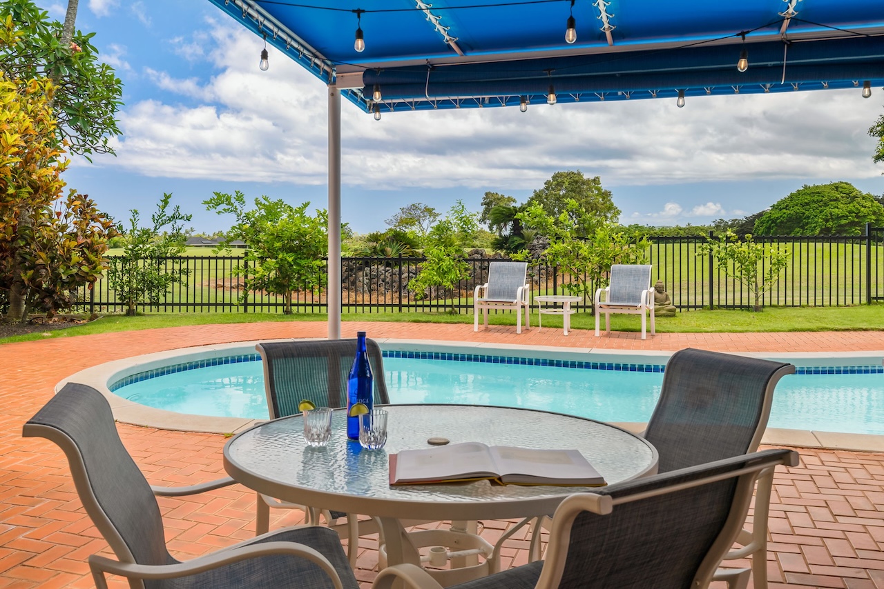 2868 Milo Hae Loop Koloa, HI 96756 - Photo 10 of 30 a roof deck with a table and chairs