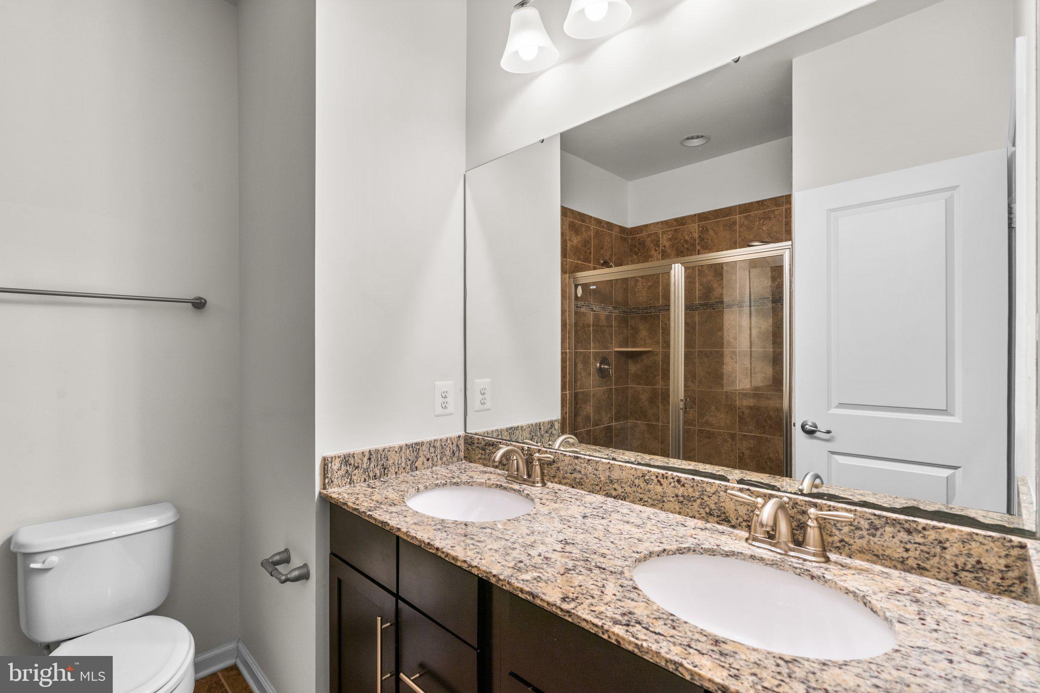 7345 Old Calvary Road Hanover, MD 21076 - Photo 18 of 44 Granite double sink vanity
